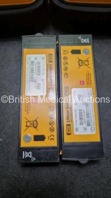 2 x Medtronic Physio Control Lifepak 1000 Defibrillators *Mfd 2021 / 20198 (Both Power Up) with 2 x 3 Lead ECG Lead and 4 x Physio Control 1000 Batteries *Li/Mn02* - 4