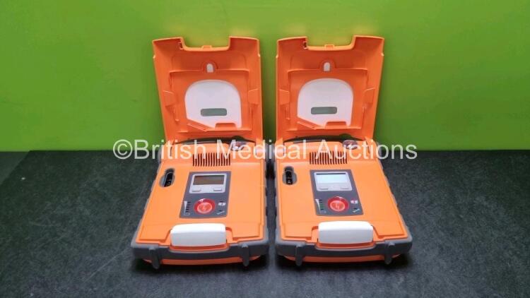 2 x Cardiac Science Powerheart G5 Defibrillators *Mfd 2015* Ref G5S-02P0 (Both Power Up With Stock Battery, Stock Battery Not Included *SN D0000001605 / D00000012632*