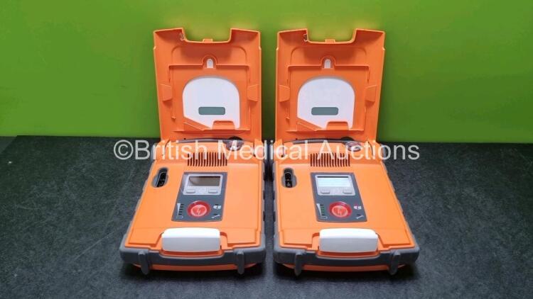 2 x Cardiac Science Powerheart G5 Defibrillators *Mfd 2019 / 2015* Ref G5S-02P0 (Both Power Up With Stock Battery, Stock Battery Not Included *SN D00000155038 / D00000012625*