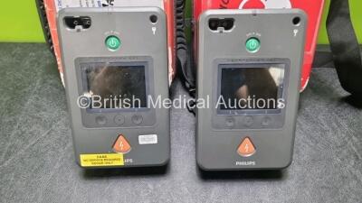 2 x Philips Heartstart FR3 Defibrillators (Both Power Up with Stock Battery, Stock Battery Not Included) In Carry Cases *SN C12F00389 / C12F00629* - 2