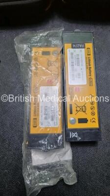 2 x Medtronic Physio Control Lifepak 1000 Defibrillators *Mfd 2016 / 2014* (Both Power Up) with 2 x 3 Lead ECG Lead , 5 x in Date Electrode Packs and 4 x Physio Control 1000 Batteries *Li/Mn02* - 3