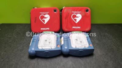 2 x Philips Heartstart HS1 Defibrillators (Both Power Up) with 1 x M5070A Battery *Install Before 05-2023* In Carry Cases *SN A16F05080 / A15C 05400*