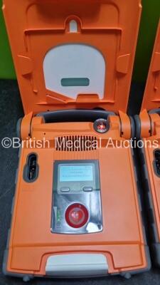 2 x Cardiac Science Powerheart G5 Defibrillators *Mfd 2019 / 2020* Ref G5S-02P0 / G5A-02P0 (Both Power Up With Stock Battery, Stock Battery Not Included *SN D00000188181 / D00000177031* - 3