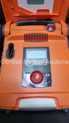 2 x Cardiac Science Powerheart G5 Defibrillators *Mfd 2019 / 2015* Ref G5S-02P0 (Both Power Up With Stock Battery, Stock Battery Not Included *SN D00000153789 / D00000012628* - 2