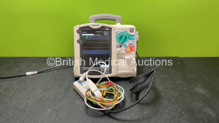 Philips Heartstart MRx Defibrillator Including Pacer, ECG and Printer Options with 1 x 3 Lead ECG Lead, 1 x Paddle Lead, 1 x M3539A Module, 1 x M3538A Battery and 1 x Philips M3725A Test Load (Powers Up)