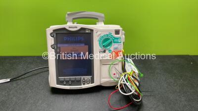 Philips Heartstart MRx Defibrillator Including Pacer, ECG and Printer Options with 1 x 3 Lead ECG Lead, 1 x Paddle Lead, 1 x M3539A Module, 1 x M3538A Battery and 1 x Philips M3725A Test Load (Powers Up)