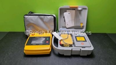 Job Lot Including 1 x Trainer 1000 Defibrillator with 1 x Lifepak 500T Remote, 1 x Trainer 1000 Remote and 1 x Philips AED Trainer (Both Untested Due to No Power Supply) In Carry Cases