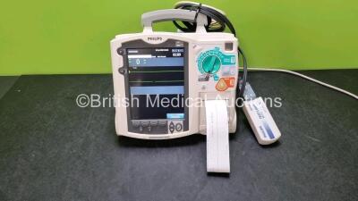 Philips MRx Heartstart Defibrillators Including Pacer, ECG and Printer Options (Powers Up) with 1 x 3 Lead ECG Leads, 1 x Paddle Lead, 1 x M3725A Test Load and 1 x M3538A Module