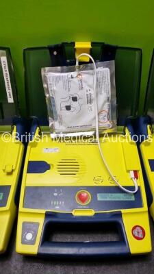 4 x Cardiac Science Powerheart AED G3 Automated External Defibrillators (All Power Up with Stock Battery Stock Battery Not Included) with 1 x In Date Electrode Packs - 3