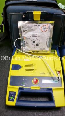 3 x Cardiac Science Powerheart AED G3 Automated External Defibrillators (All Power Up with Stock Battery Stock Battery Not Included) In Carry Case with 3 x In Date Electrode Packs and 1 x Ambu Res Cue Mask - 4