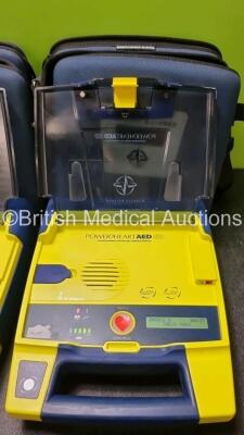 3 x Cardiac Science Powerheart AED G3 Automated External Defibrillators (All Power Up with Stock Battery Stock Battery Not Included) In Carry Case with 2 x In Date Electrode Packs - 2