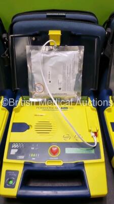 3 x Cardiac Science Powerheart AED G3 Automated External Defibrillators (All Power Up with Stock Battery Stock Battery Not Included) In Carry Case with 2 x In Date Electrode Packs - 3