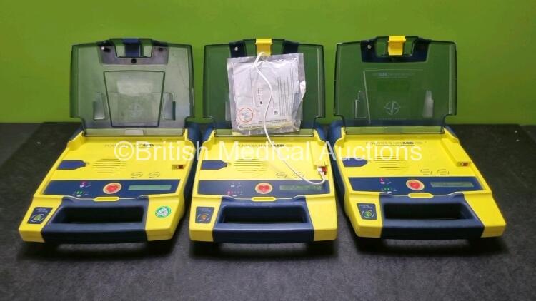 3 x Cardiac Science Powerheart AED G3 Automated External Defibrillators (All Power Up with Stock Batteries, Batteries Not Included)