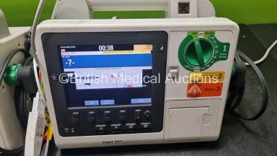 2 x Philips Heartstart XL+ Defibrillators (Both Power Up) Including ECG and Printer Options with 2 x ECG Lead and 2 x Paddle Leads - 2