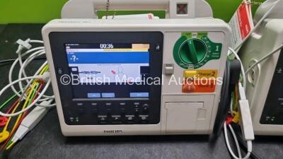 2 x Philips Heartstart XL+ Defibrillators (Both Power Up) Including ECG and Printer Options with 2 x ECG Lead and 2 x Paddle Leads - 3