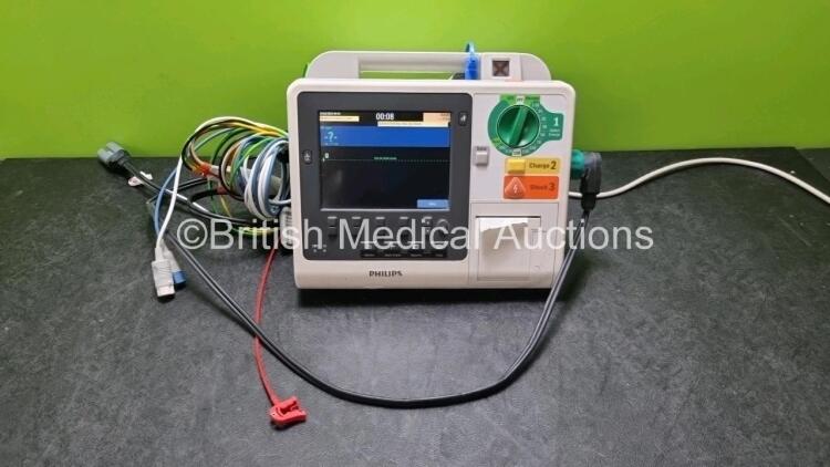 Philips Heartstart XL+ Defibrillator (Powers Up) Including Pacer, ECG, SpO2 and Printer Options with 1 x 3 Lead ECG Lead, 1 x Paddle Lead and 1 x Battery *SN US91202234*