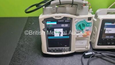 Job Lot Including 1 x Philips Heartstart MRx Defibrillator Including Pacer, ECG and Printer Options with 1 x Paddle Lead, Paddle Dock , 1 x M3538A Battery and 1 x Philips M3539A Module and 1 x 3 Lead ECG Lead (Powers Up) and 1 x Philips Heartstart XL+ De - 3