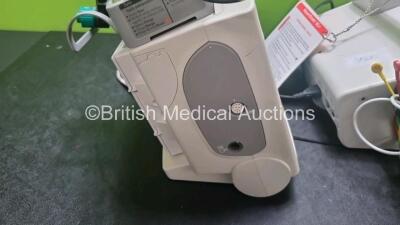 Job Lot Including 1 x Philips Heartstart MRx Defibrillator Including Pacer, ECG and Printer Options with 1 x Paddle Lead, Paddle Dock , 1 x M3538A Battery and 1 x Philips M3539A Module and 1 x 3 Lead ECG Lead (Powers Up) and 1 x Philips Heartstart XL+ De - 6