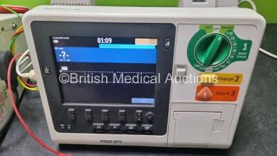 2 x Philips Heartstart XL+ Defibrillators (Both Power Up) Including ECG and Printer Options with 2 x ECG Lead and 1 x Paddle Leads - 2