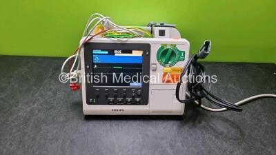 Philips Heartstart XL+ Defibrillator (Powers Up) Including Pacer, ECG, SpO2 and Printer Options with 1 x 3 Lead ECG Lead, 1 x Paddle Lead and 1 x Battery *SN US91202233*