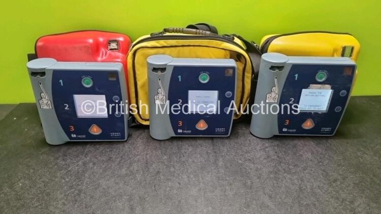 3 x Laerdal Heartstart FR2+ Defibrillators (All Power Up with Stock Batteries, Batteries Not Included) In Carry Cases