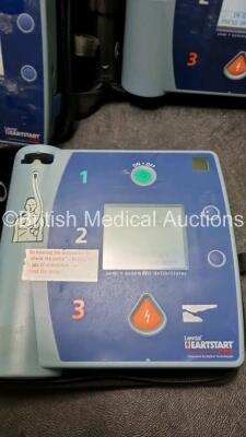 3 x Laerdal Heartstart FR2 Defibrillators (All Power Up with Stock Batteries, Batteries Not Included) In Carry Cases - 4