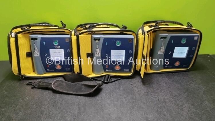 3 x Laerdal Heartstart FR2+ Defibrillators (All Power Up with Stock Batteries, Batteries Not Included) In Carry Cases