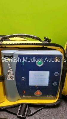 3 x Laerdal Heartstart FR2+ Defibrillators (All Power Up with Stock Batteries, Batteries Not Included) In Carry Cases - 3