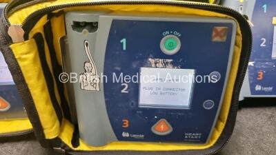 3 x Laerdal Heartstart FR2+ Defibrillators (All Power Up with Stock Batteries, Batteries Not Included) In Carry Cases - 3