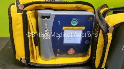 3 x Laerdal Heartstart FR2+ Defibrillators (All Power Up with Stock Batteries, Batteries Not Included) In Carry Cases - 4