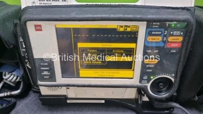 Medtronic Lifepak 12 Biphasic Defibrillator *Mfd 2001* P/N VLP12-02-002132 (Powers Up and Passes Self Test) Including ECG, SpO2, NIBP Options with 1 x Ref 1111-000021 4 Lead ECG Lead, 1 x Ref 11111-000023 6 Lead ECG Lead, 2 x Batteries, 1 x Paddle Lead, 1 - 2