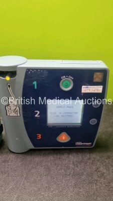 Job Lot Including 2 x Laerdal Heartstart FR2 Defibrillators and 1 x Laerdal Heartstart FR2+ Defibrillator (All Power Up) with 3 x Philips M3863A Battery *Install Before 2020 / 2023* - 2