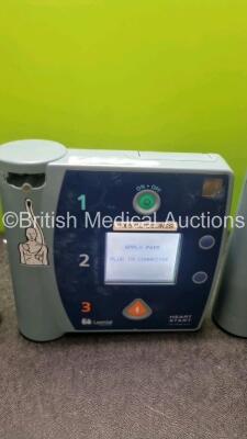 Job Lot Including 2 x Laerdal Heartstart FR2 Defibrillators and 1 x Laerdal Heartstart FR2+ Defibrillator (All Power Up) with 3 x Philips M3863A Battery *Install Before 2020 / 2023* - 3