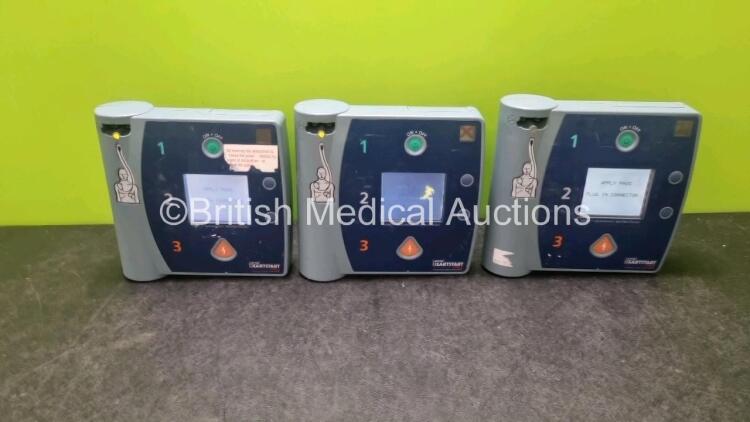 3 x Laerdal Heartstart FR2 Defibrillators (All Power Up) with 3 x Philips M3863A Battery *Install Before 2020 / 2018 / 2023*