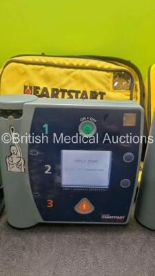 3 x Laerdal Heartstart FR2 Defibrillators (All Power Up) In Carry Case with 1 x Philips M3863A Battery *Install Before 2024* - 3