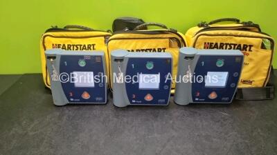 3 x Laerdal Heartstart FR2+ Defibrillators (All Power Up with Stock Battery, Battery Not Included) In Carry Case