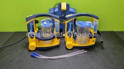 2 x LSU Laerdal Suction Units (Both Power Up, Both with Damage to Casing - See Photo) with 1 x LSU Wall Mounting Bracket, 2 x Suction Cups, 2 x Batteries and 2 x Hoses