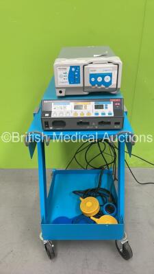 Covidien Force FX 8C Electrosurgical / Diathermy Generator on Trolley with 3 x Footswitches and 1 x Viro Vac Surgical Smoke Evacuation Unit (Powers Up with Damaged Smoke Evacuation Unit Casing-See Photos) *SN 30529A, V08837*