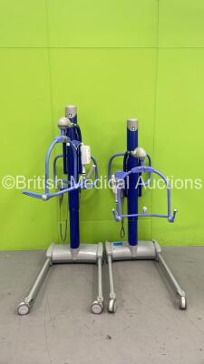 2 x Arjo Maxi-Move Electric Patient Hoists with 2 x Controllers and 1 x Battery (Both No Power) *S/N KMC-18504*