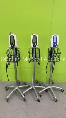 2 x Welch Allyn 420 Series Patient Monitors on Stands and 1 x Welch Allyn SPOT Vital Signs Monitor on Stand (All Power Up) *S/N 200303050 / 200213109 / 200805942*