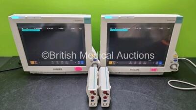 2 x Philips IntelliVue MP70 Patient Monitors (Both Power Up) with 2 x Philips M3001A Opt A01C06 Including ECG, SpO2, NBP, Press and Temp Options (1 x with Slight Crack In Casing - See Photo) *SN DE717N8599 / DE717N0902 / DE843A1000 / DE843A0996*