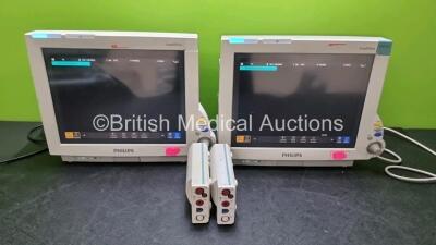 2 x Philips IntelliVue MP70 Patient Monitors (Both Power Up) with 2 x Philips M3001A Opt A01C06 Including ECG, SpO2, NBP, Press and Temp Options *SN DE717N8258 / DE717N0313 / DE843A0990 / DE843A0995*