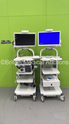 2 x Olympus Stack Trolleys with 2 x Olympus OEV262H Monitors, Olympus Evis Lucera Elite CV-290 Digital Processor, Olympus Lucera Elite CLV-290SL Light Source and Olympus MAJ-1911 Pigtail Connector (Powers Up) *S/N7767436 / 7727626 / 7720228*