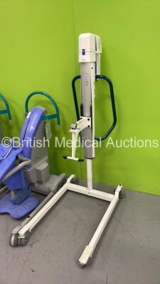 2 x Arjo Encore Electric Patient Hoist with Controllers (Both Not Power Tested Due to No Batteries) and 1 x Arjo Ambulift Classic Electric Patient Hoist with Controllers (No Battery) GB2103919130 006 / GB 1803 918576 001* - 2