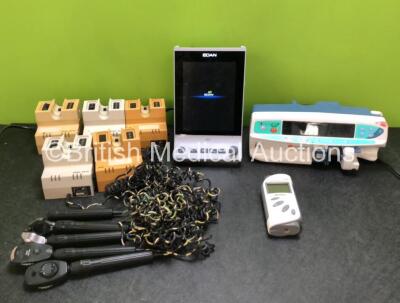 Mixed Lot Including 1 x CareFusion Alaris PK Syringe Pump (Powers Up with Blank Screen) 1 x Edan iM3 Patient Monitor (Powers Up) 1 x Edan H100 Pulse Oximeter (Missing Battery Casing - See Photos) 3 x Heine EN90 Units with 2 x Duo Attachments and 5 x Otosc