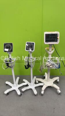 1 x Philips SureSigns VM4 Patient Monitor on Stand (Powers Up) and 2 x Blood Pressure Meters on Stands (1 x Missing Front Face Cover) *S/N US12556222*