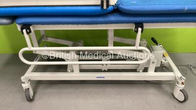 2 x Huntleigh Akron Electric Patient Examination Couch (1 x Powers Up - 1 x Not Power Tested Due to Cut Power Cables) - 2