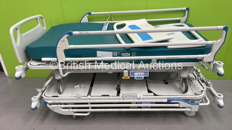 2 x Hill-Rom Electric Hospital Beds with Controllers and 1 x Mattress (Both Power Up - Mattress Water Damaged)