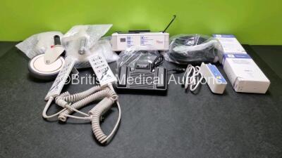 Mixed Lot Including 2 x Anetic Aid Remote Controllers, 4 x Caster 150 Wheels, 1 x Philips Footswitch, 1 x Unknown Manufacturer Footswitch, 2 x Boxes of 250 x Thermometer Probe Covers, 1 x Herida Pump , 1 x Hillrom Controller