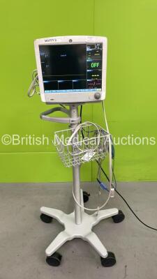 GE Carescape B650 Patient Monitor on Stand with GE MultiParameter Module Ref 2016793-002 with ECG, Temp/Co, P1/3, P2/4, SPO2, NIBP and DefibSync Options and Selection of Leads (Powers Up) *S/N SEW14268424HA*